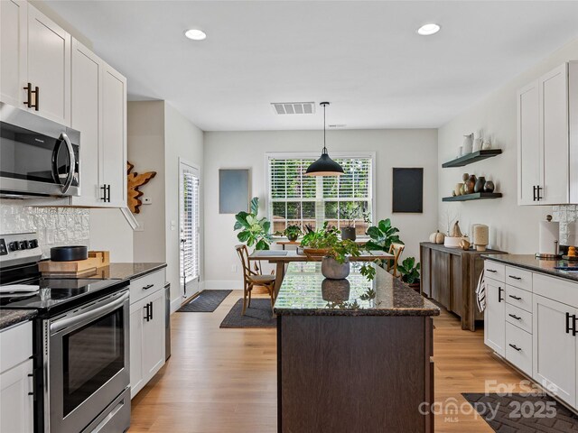 218 Water Leaf Dr, Weaverville, NC 28787 - kitchen featuring appliances with stainless steel finishes, open shelves, backsplash, recessed lighting, and light wood-style flooring
