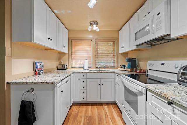 139 Ivy Ridge Church Rd, Mars Hill, NC 28754 - kitchen featuring white appliances, white cabinetry, light wood-style flooring, and light stone counters