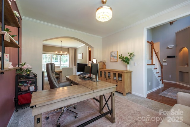 2908 Barnard Castle Ln, Matthews, NC 28104 - carpeted office with a chandelier, arched walkways, ornamental molding, and baseboards