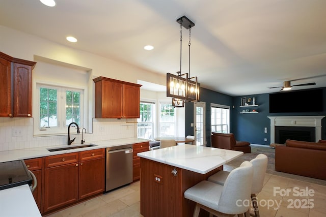 2908 Barnard Castle Ln, Matthews, NC 28104 - kitchen with dishwasher, a sink, decorative backsplash, a center island, and recessed lighting