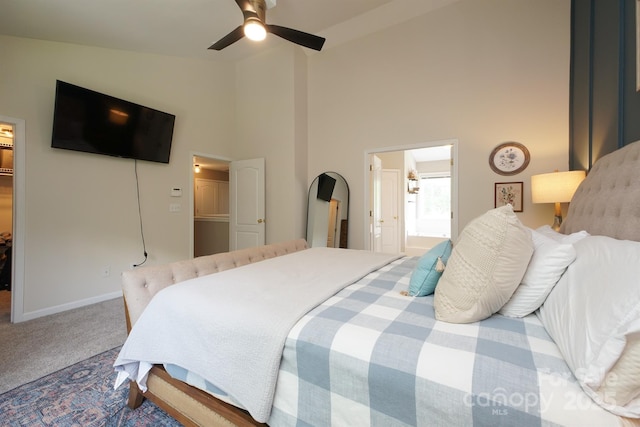 2908 Barnard Castle Ln, Matthews, NC 28104 - carpeted bedroom with a walk in closet, high vaulted ceiling, ensuite bathroom, a ceiling fan, and baseboards
