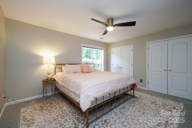 2908 Barnard Castle Ln, Matthews, NC 28104 - bedroom featuring two closets, baseboards, carpet, and ceiling fan