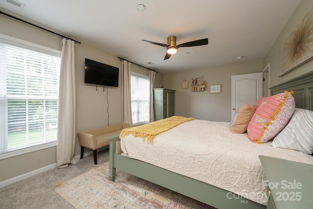 2908 Barnard Castle Ln, Matthews, NC 28104 - bedroom with light colored carpet, baseboards, and a ceiling fan