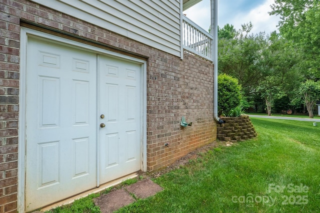 2908 Barnard Castle Ln, Matthews, NC 28104 - entrance to property with brick siding, a yard, and a balcony