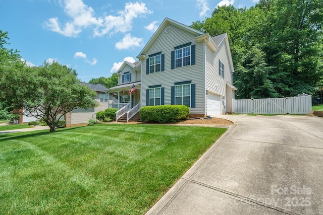 2908 Barnard Castle Ln, Matthews, NC 28104 - view of front facade featuring driveway, an attached garage, a gate, and covered porch
