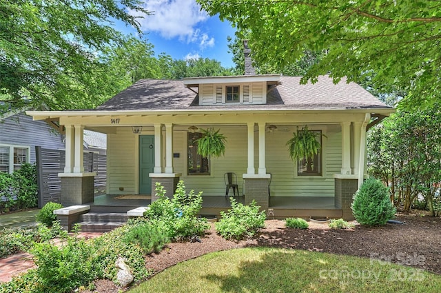 1417 The Plz, Charlotte, NC 28205 - bungalow with a porch, a chimney, and roof with shingles