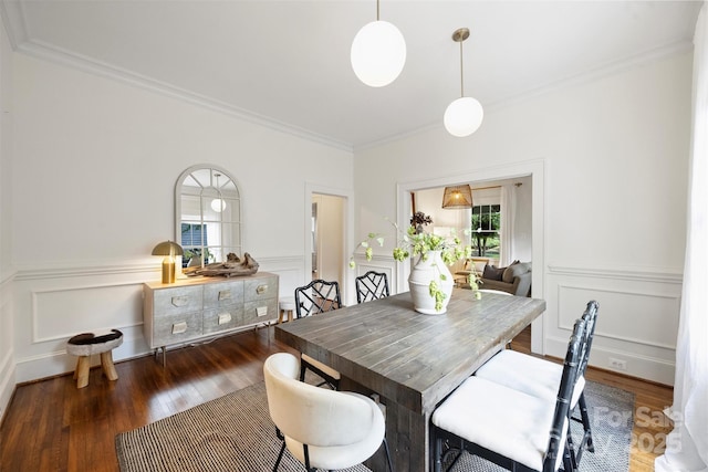 1417 The Plz, Charlotte, NC 28205 - dining space with wood finished floors, ornamental molding, a decorative wall, and a wainscoted wall