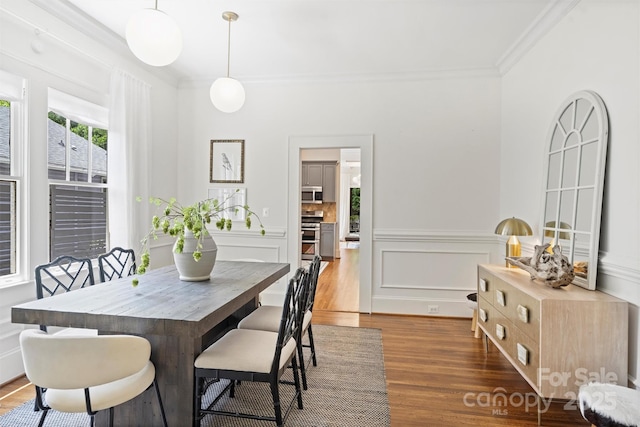 1417 The Plz, Charlotte, NC 28205 - dining area featuring wood finished floors, crown molding, and wainscoting