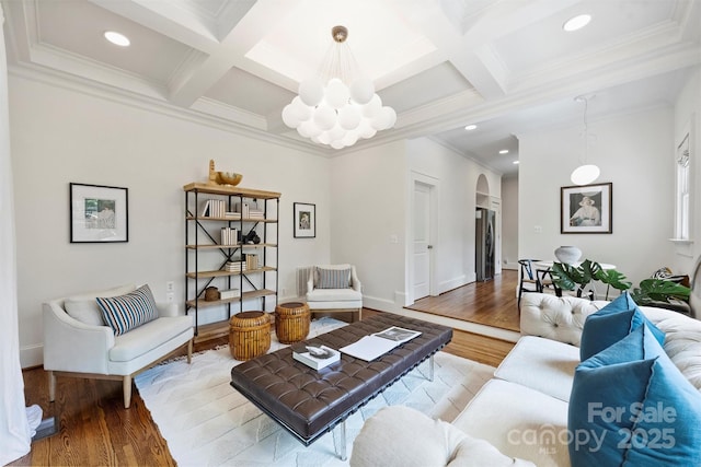 1417 The Plz, Charlotte, NC 28205 - living area featuring a chandelier, wood finished floors, coffered ceiling, arched walkways, and beamed ceiling