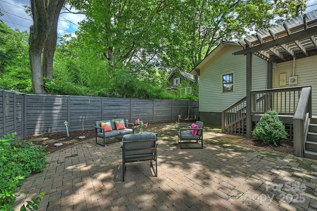 1417 The Plz, Charlotte, NC 28205 - fenced backyard with a patio area, a pergola, and outdoor lounge area