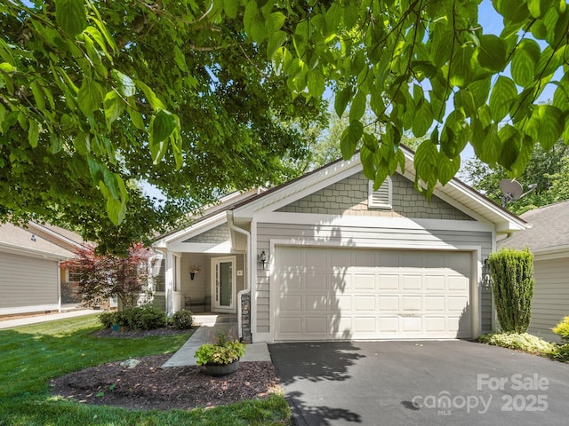 20 E Fairway View Ct, Etowah, NC 28729 - view of front of home with asphalt driveway and an attached garage