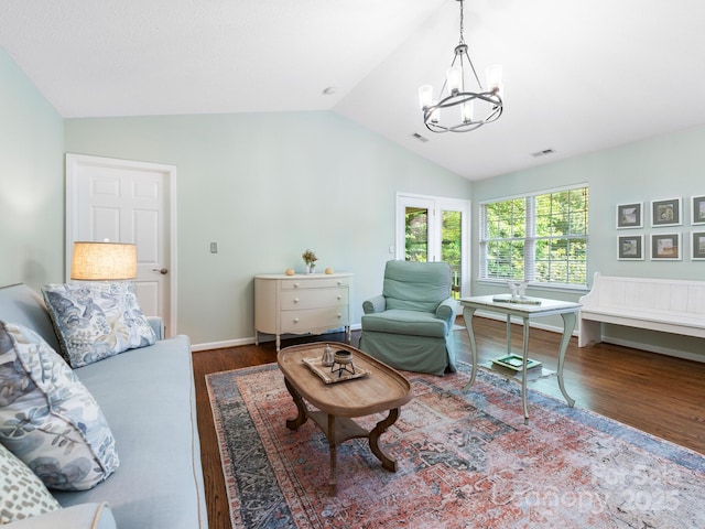 20 E Fairway View Ct, Etowah, NC 28729 - living room featuring wood finished floors, a chandelier, and vaulted ceiling