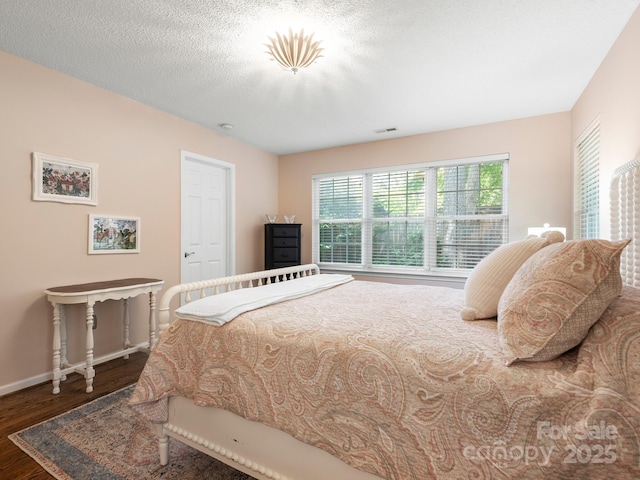 20 E Fairway View Ct, Etowah, NC 28729 - bedroom featuring wood finished floors and baseboards