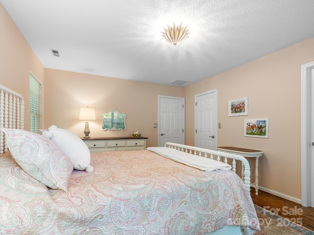 20 E Fairway View Ct, Etowah, NC 28729 - bedroom featuring wood finished floors and baseboards