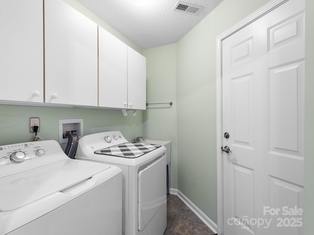 20 E Fairway View Ct, Etowah, NC 28729 - laundry room with cabinet space, independent washer and dryer, and a textured ceiling