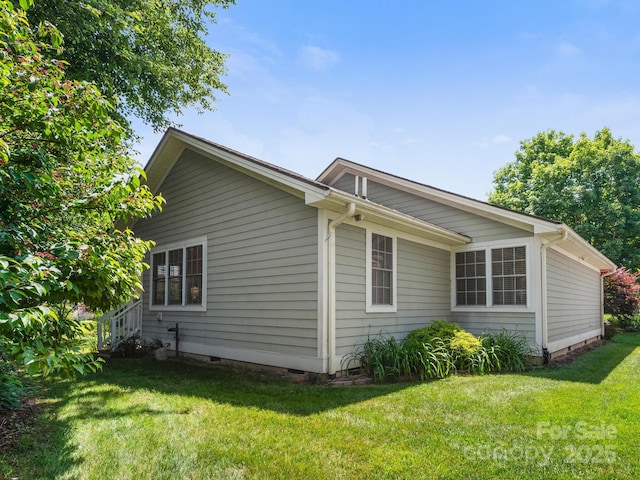 20 E Fairway View Ct, Etowah, NC 28729 - view of side of home with a yard and crawl space