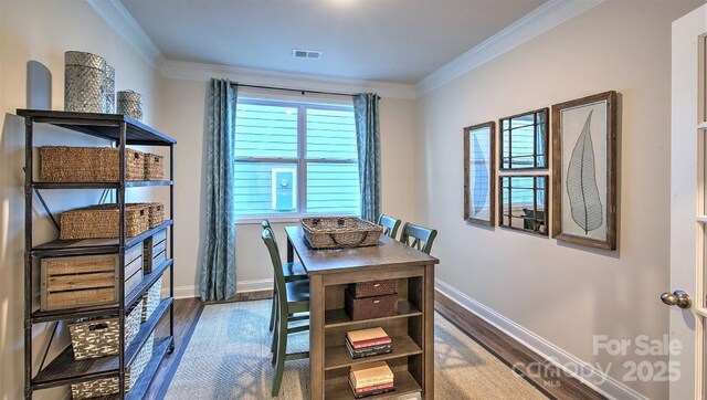33 Silverthorne Ct, Hendersonville, NC 28792 - dining room featuring dark wood-style flooring, crown molding, and baseboards