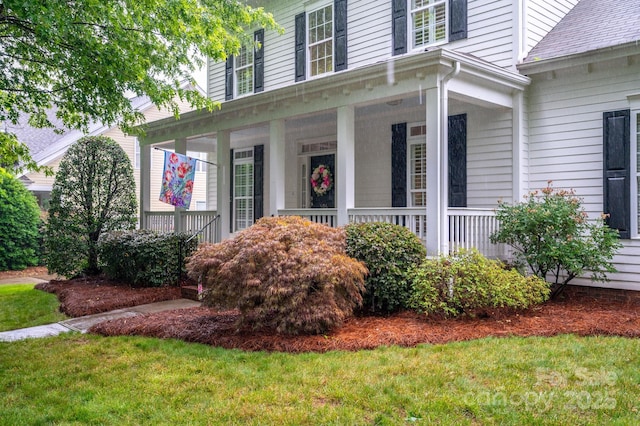 506 Academy St, Mcadenville, NC 28101 - doorway to property featuring covered porch and a lawn