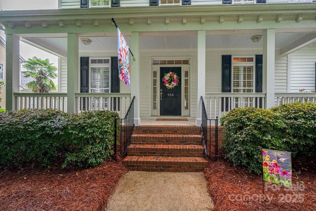 506 Academy St, Mcadenville, NC 28101 - entrance to property with a porch