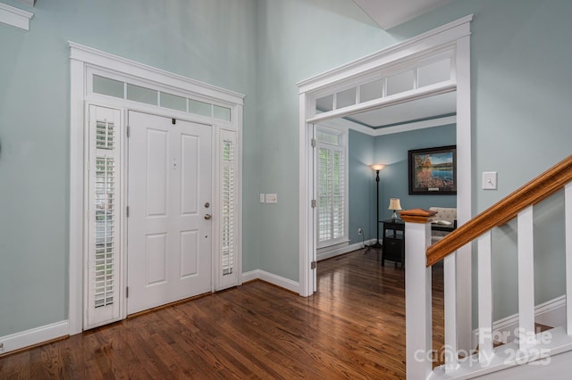 506 Academy St, Mcadenville, NC 28101 - foyer with dark wood-style flooring, baseboards, stairs, and a towering ceiling