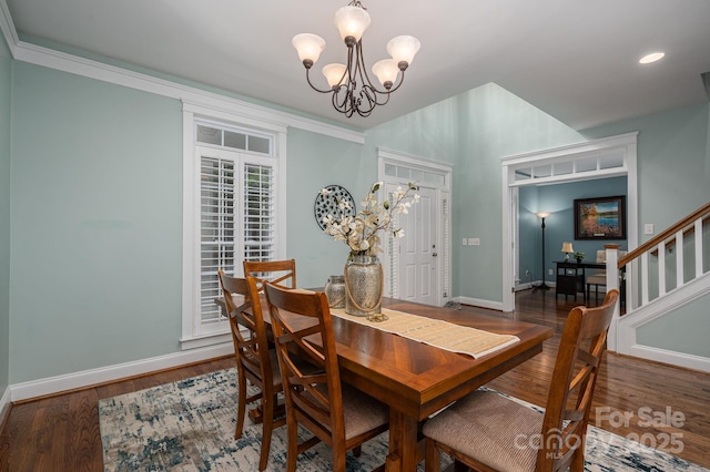 506 Academy St, Mcadenville, NC 28101 - dining space featuring a chandelier, baseboards, wood finished floors, and stairway