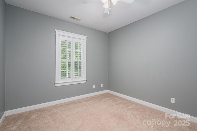 506 Academy St, Mcadenville, NC 28101 - carpeted empty room with a ceiling fan and baseboards
