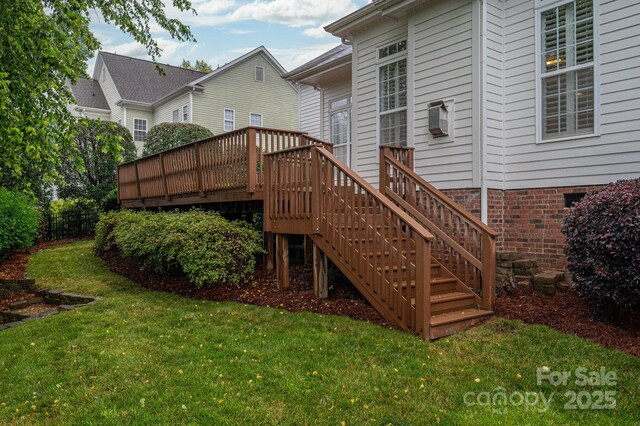 506 Academy St, Mcadenville, NC 28101 - rear view of house featuring a yard, a wooden deck, stairway, and crawl space