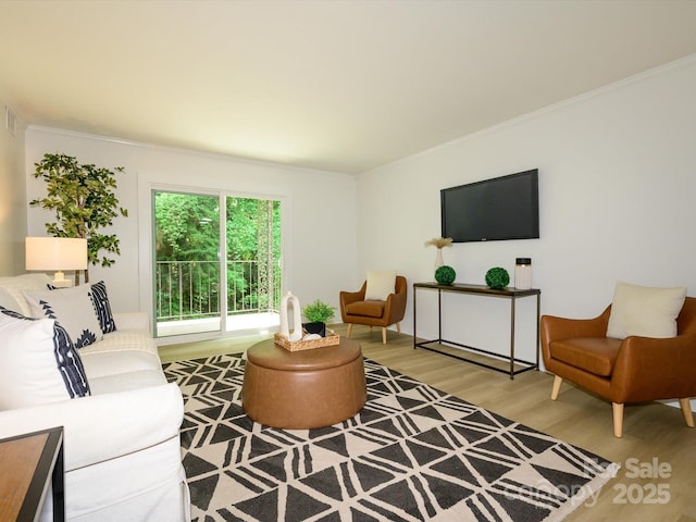 4754 Hedgemore Dr Unit E, Charlotte, NC 28209 - living room with wood finished floors and crown molding