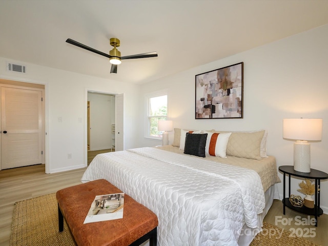 4754 Hedgemore Dr Unit E, Charlotte, NC 28209 - bedroom with light wood-type flooring and a ceiling fan