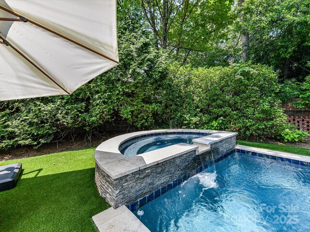2526 Sherwood Ave, Charlotte, NC 28207 - view of pool with a yard and a pool with connected hot tub