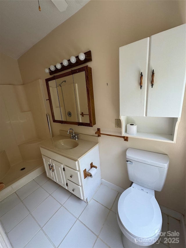 232 Cole Hollow Rd, Newland, NC 28657 - bathroom featuring vanity, tile patterned flooring, and a shower