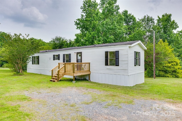 976 Neely Store Rd, Rock Hill, SC 29730 - manufactured / mobile home featuring a deck and a front lawn