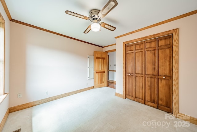 12705 Caldwell Rd, Charlotte, NC 28213 - unfurnished bedroom featuring ornamental molding, light carpet, a closet, and ceiling fan