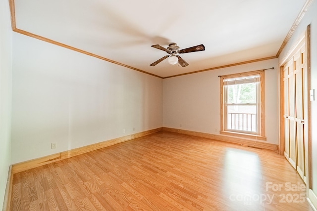 12705 Caldwell Rd, Charlotte, NC 28213 - unfurnished room featuring ornamental molding, light wood finished floors, and a ceiling fan