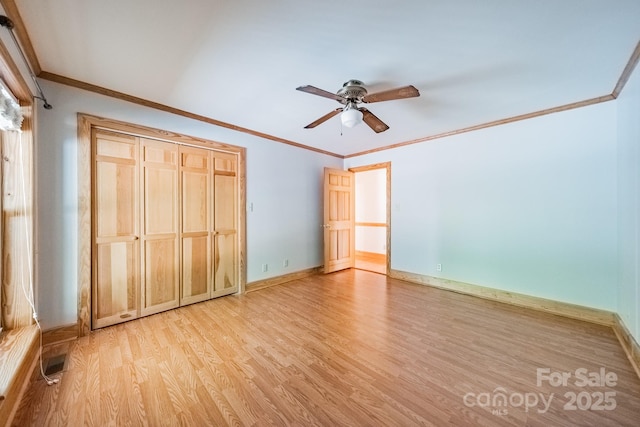 12705 Caldwell Rd, Charlotte, NC 28213 - unfurnished bedroom featuring light wood finished floors, ornamental molding, and ceiling fan