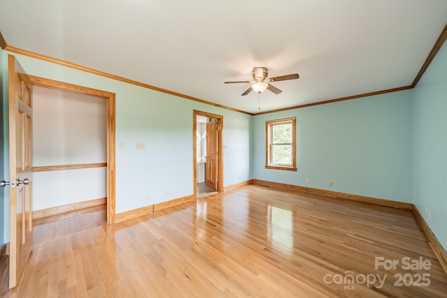 12705 Caldwell Rd, Charlotte, NC 28213 - unfurnished room featuring ceiling fan, light wood-style floors, and ornamental molding