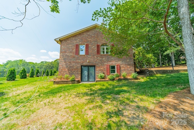 12705 Caldwell Rd, Charlotte, NC 28213 - rear view of property with brick siding and a yard