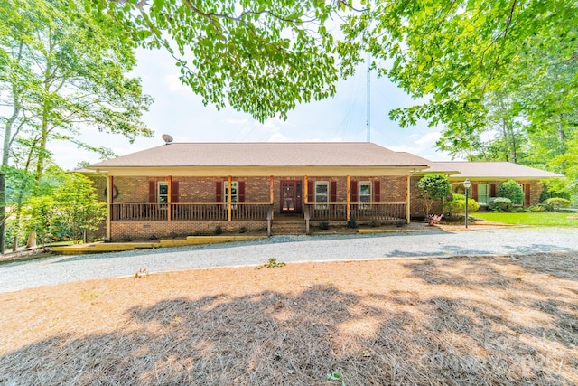 12705 Caldwell Rd, Charlotte, NC 28213 - ranch-style house featuring covered porch, brick siding, and driveway