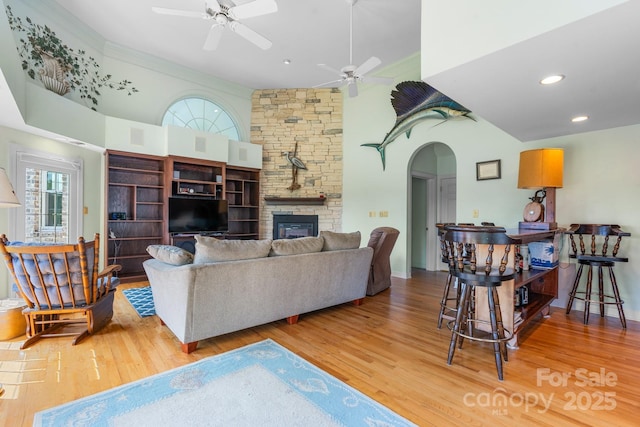 3541 Blankenship Dr, Morganton, NC 28655 - living room with ceiling fan, wood finished floors, a fireplace, crown molding, and recessed lighting