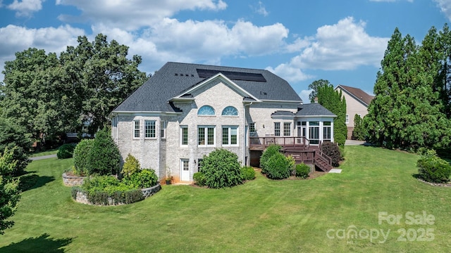 3541 Blankenship Dr, Morganton, NC 28655 - rear view of house with a yard, a wooden deck, and brick siding
