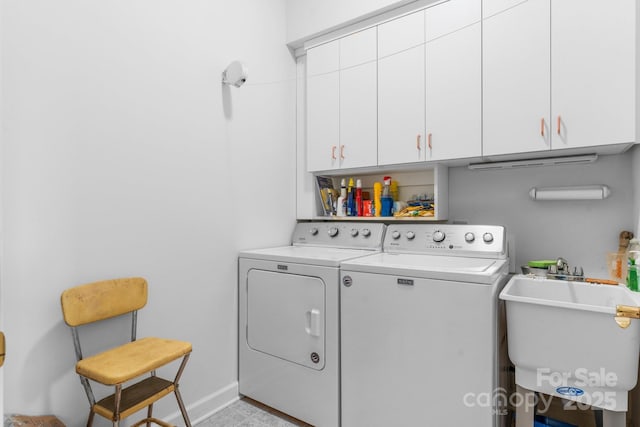 3541 Blankenship Dr, Morganton, NC 28655 - laundry area featuring cabinet space and independent washer and dryer