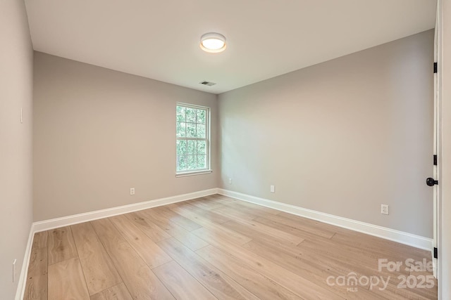 7810 Leisure Ln, Huntersville, NC 28078 - empty room with light wood-style floors and baseboards