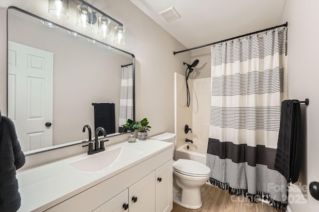 7810 Leisure Ln, Huntersville, NC 28078 - full bathroom with vanity, wood finished floors, and shower / bath combination with curtain