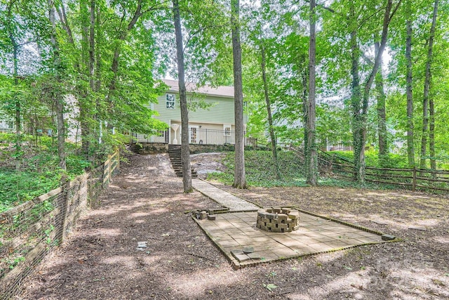 7810 Leisure Ln, Huntersville, NC 28078 - view of yard with a fire pit, stairs, and a patio