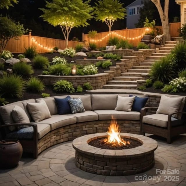 7810 Leisure Ln, Huntersville, NC 28078 - view of patio / terrace with stairway and an outdoor living space with a fire pit