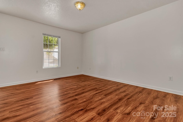 222 New Stock Rd, Weaverville, NC 28787 - spare room with wood finished floors and baseboards
