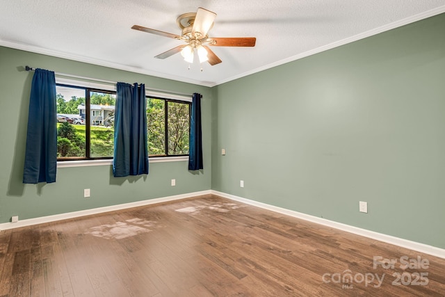 15 Lake Dr Unit D2, Laurel Park, NC 28739 - empty room with wood finished floors, ceiling fan, ornamental molding, baseboards, and a textured ceiling