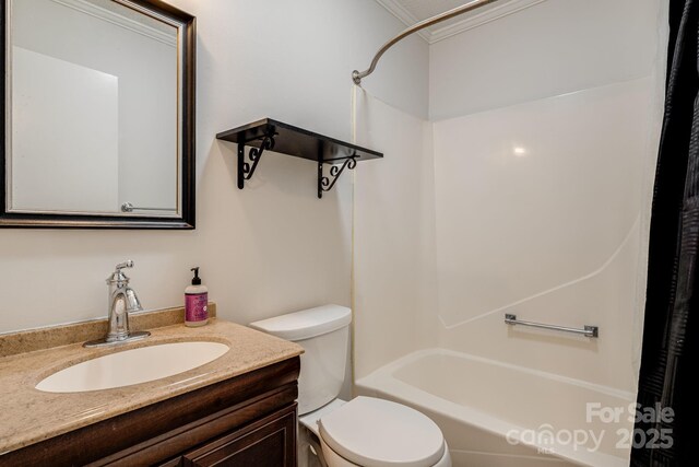 15 Lake Dr Unit D2, Laurel Park, NC 28739 - full bathroom featuring shower / bathtub combination with curtain, toilet, vanity, and ornamental molding