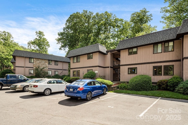 15 Lake Dr Unit D2, Laurel Park, NC 28739 - view of building exterior with uncovered parking