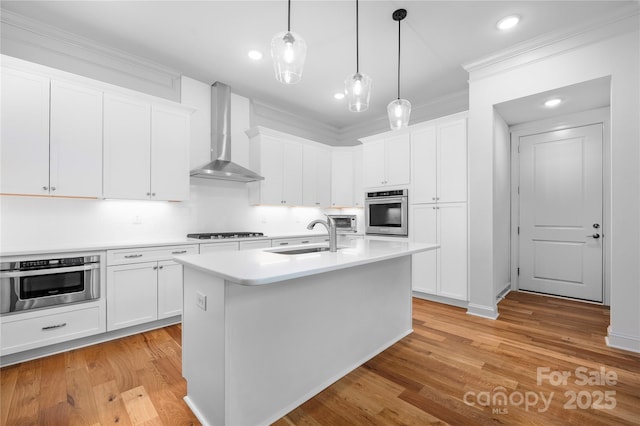 3008 Laney Pond Rd, Matthews, NC 28104 - kitchen featuring wall chimney range hood, oven, a sink, gas cooktop, and ornamental molding